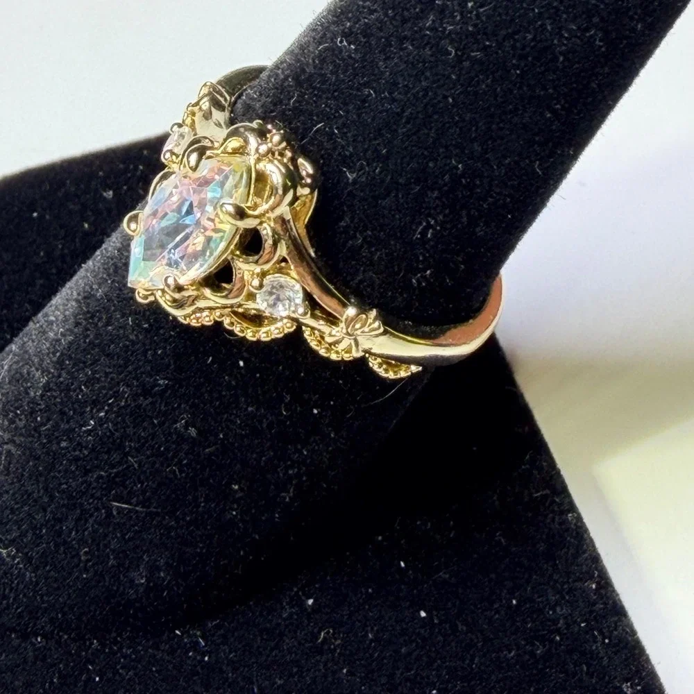 Fragrant Jewels Gold Tone Marquise Iridescent Stone Filigree Bow Ring Size 8.25